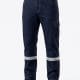 Dark blue denim cargo work pants with yellow stitching and reflective bands around the lower legs, paired with black work boots. -