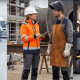 Collage showing industrial workers: a factory technician with a tablet at a production line, and two tradespeople discussing beside a forklift and warehouse staff handling boxes. -